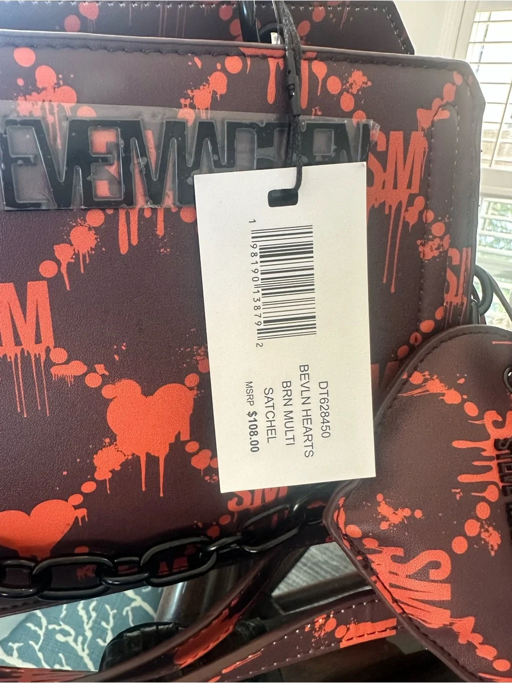 Steve Madden Bevelyn Hearts Satchel in Black & Orange